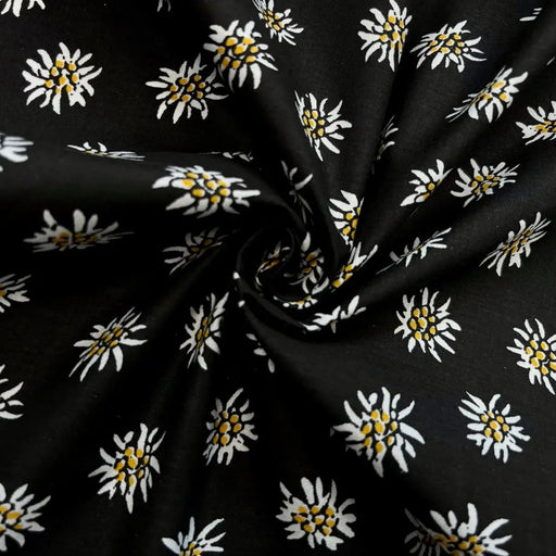 schwarze-baumwolle-edelweiss-blume-stoff-stoffpilz
