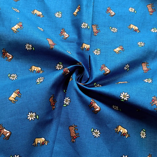 kuehe-edelweiss-blauer-cretonne-baumwolle-druck-stoff-stoffpilz