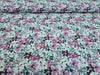 aqua-gruener-baumwolljersey-mit-blumen-in-lila-violett-stoff-stoffpilz