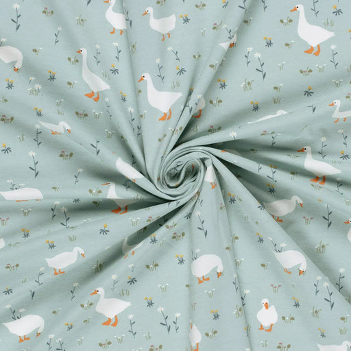 hellblau-enten-blumen-trikot-muster-stoff-stoffpilz