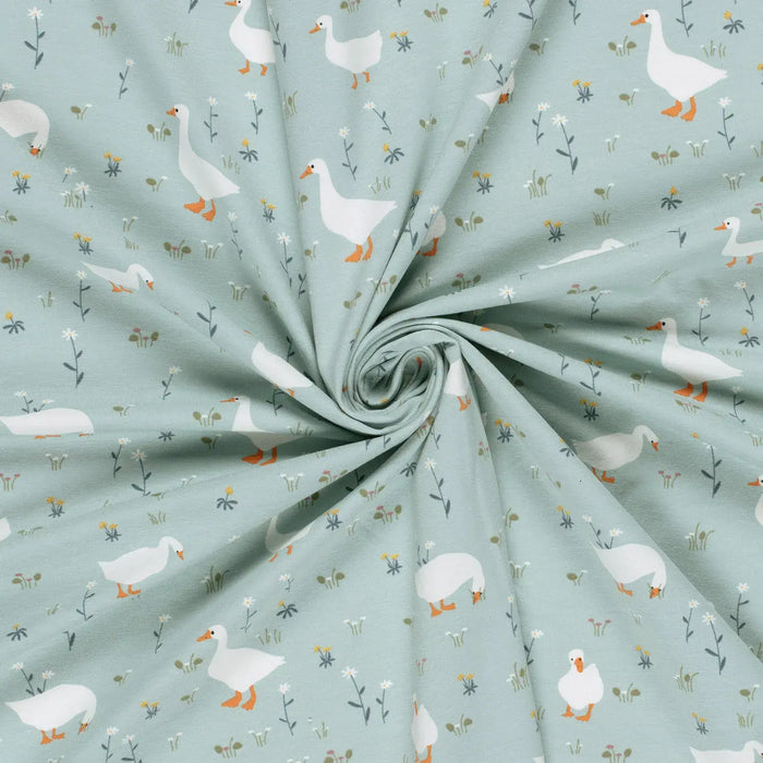 hellblau-enten-blumen-trikot-muster-stoff-stoffpilz