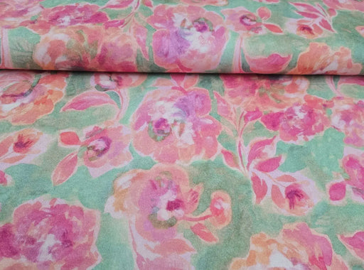 grüner-viskose-jersey-mit-abstrakten-blumen-in-rosa-stoff-stoffpilz