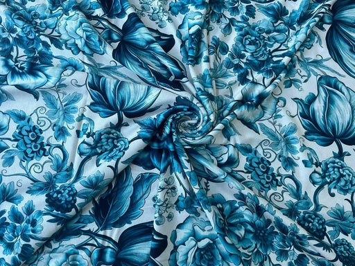 viskosejersey-mit-abstraktem-blumenmuster-tuerkis-stoffe-stoffpilz