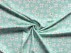 stoffgeschaeft-stoffpilz-stoffe-hilco-baumwolle-blumen-tuerkis-jersey-baumwolljersey-stoffladen-stoff-blume-mint