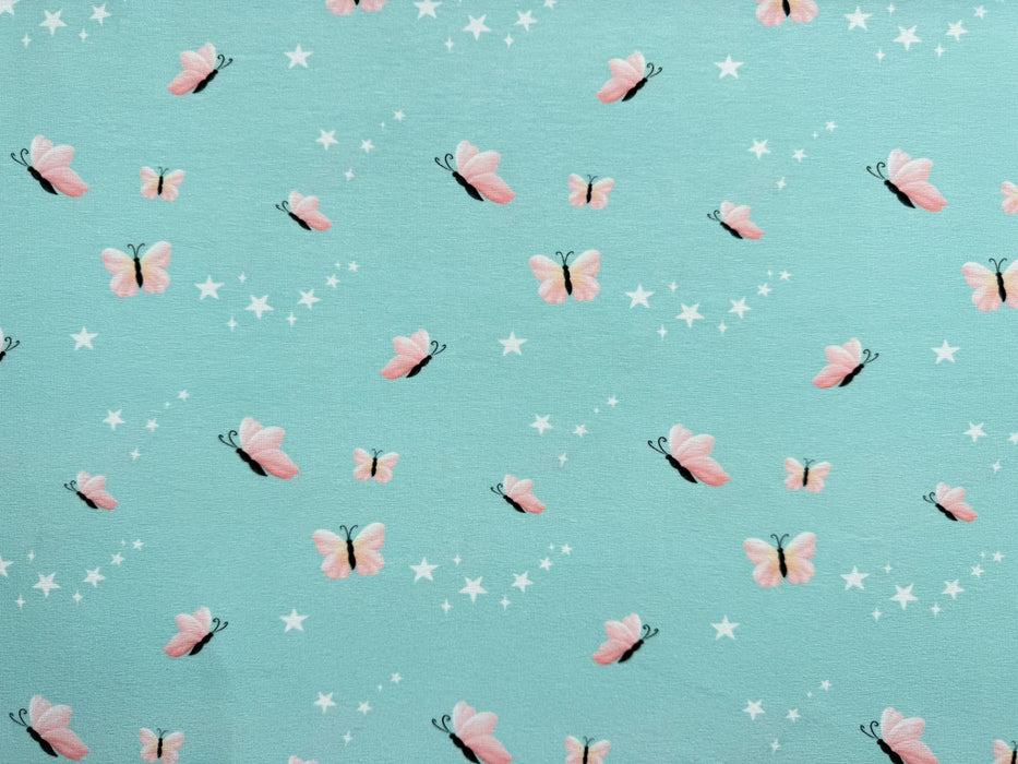 stoffgeschaeft-stoffpilz-stoffe-hilco-baumwolle-jersey-schmetterlinge-tuerkis-baumwolljersey-stoff-stoffladen-suess